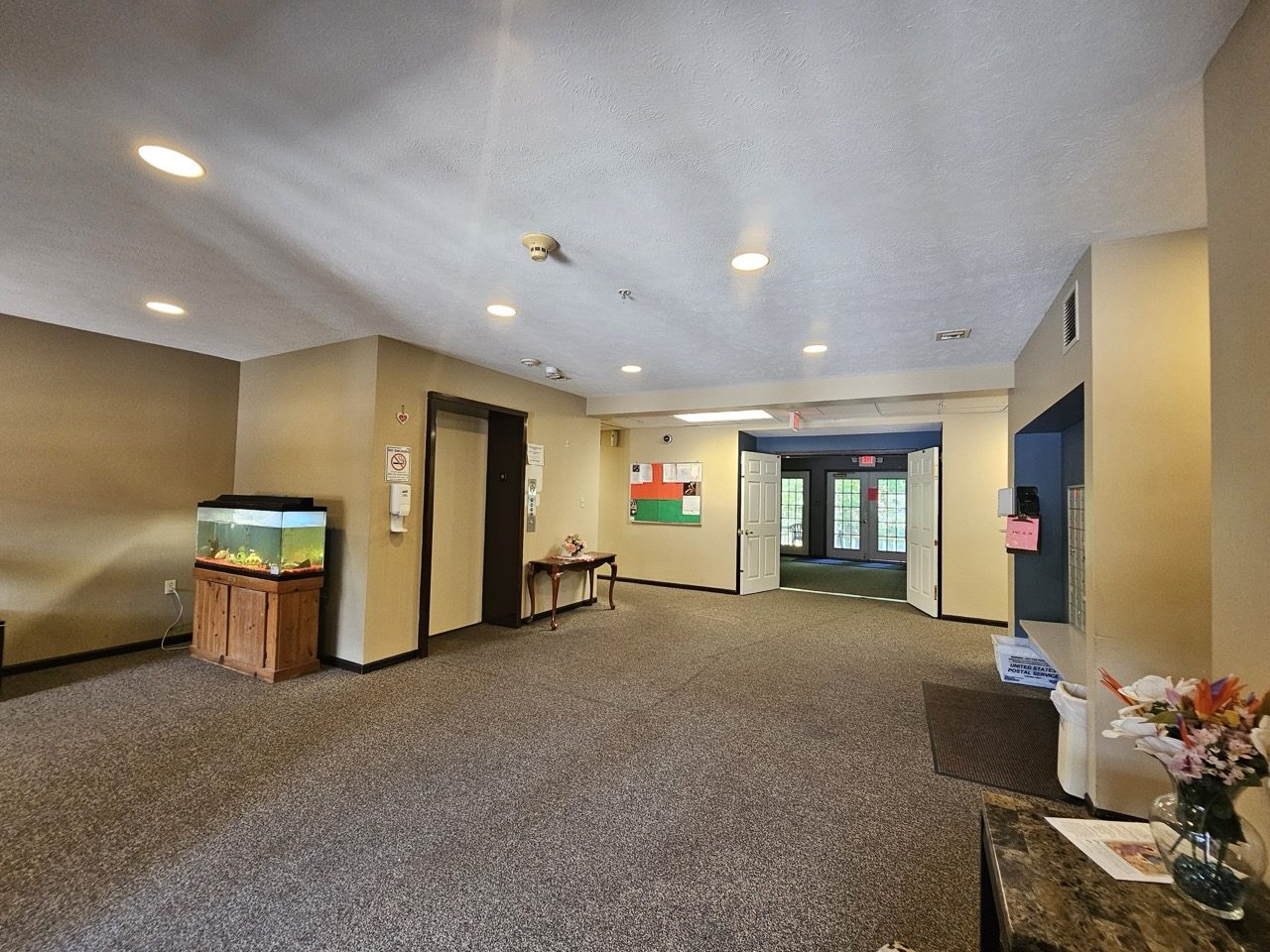 Apartment building lobby and mail area after renovation.